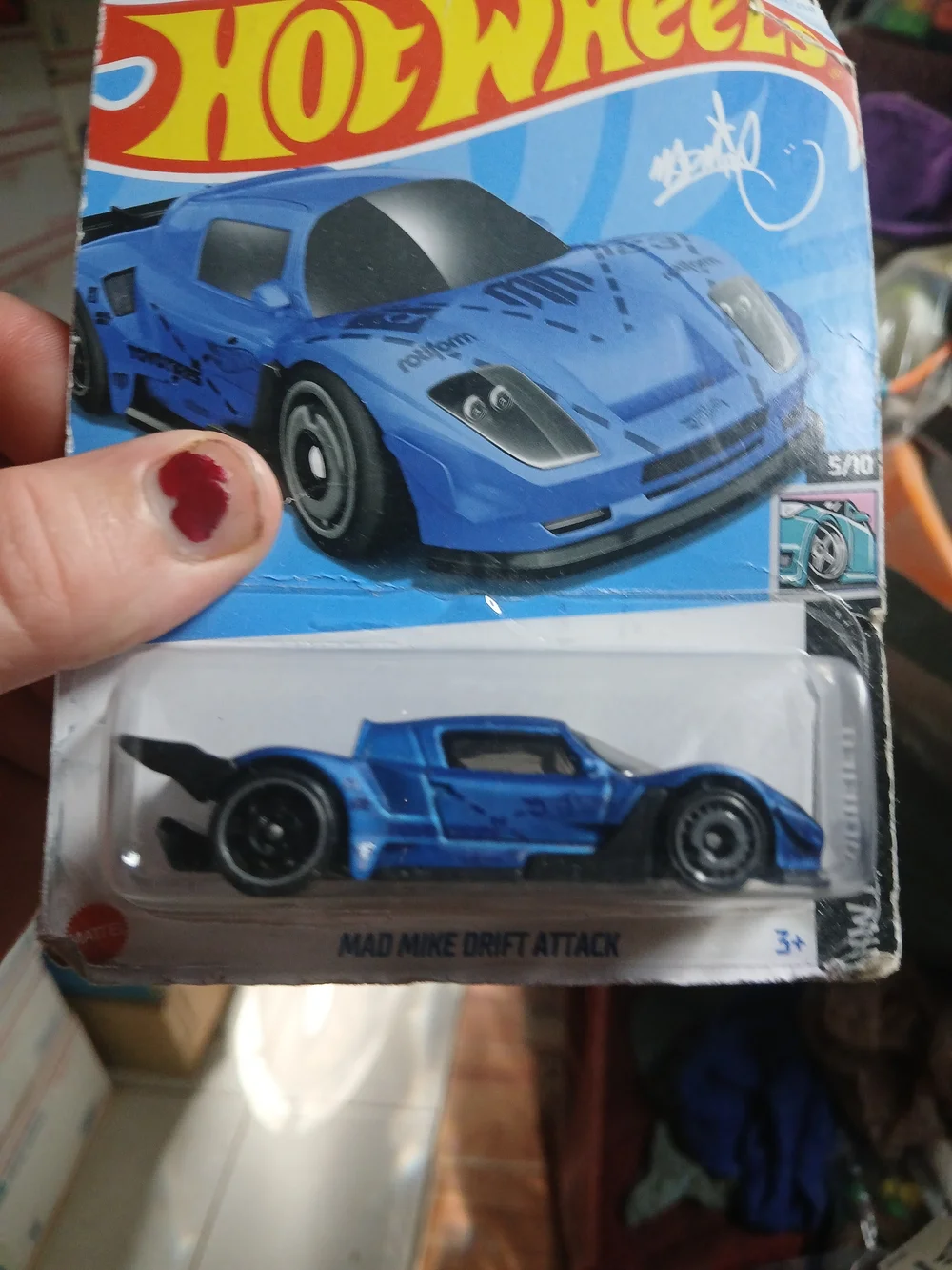 blue Hot Wheels Mad Mike Drift Attack diecast car in 1:64 scale from the 2024 HW